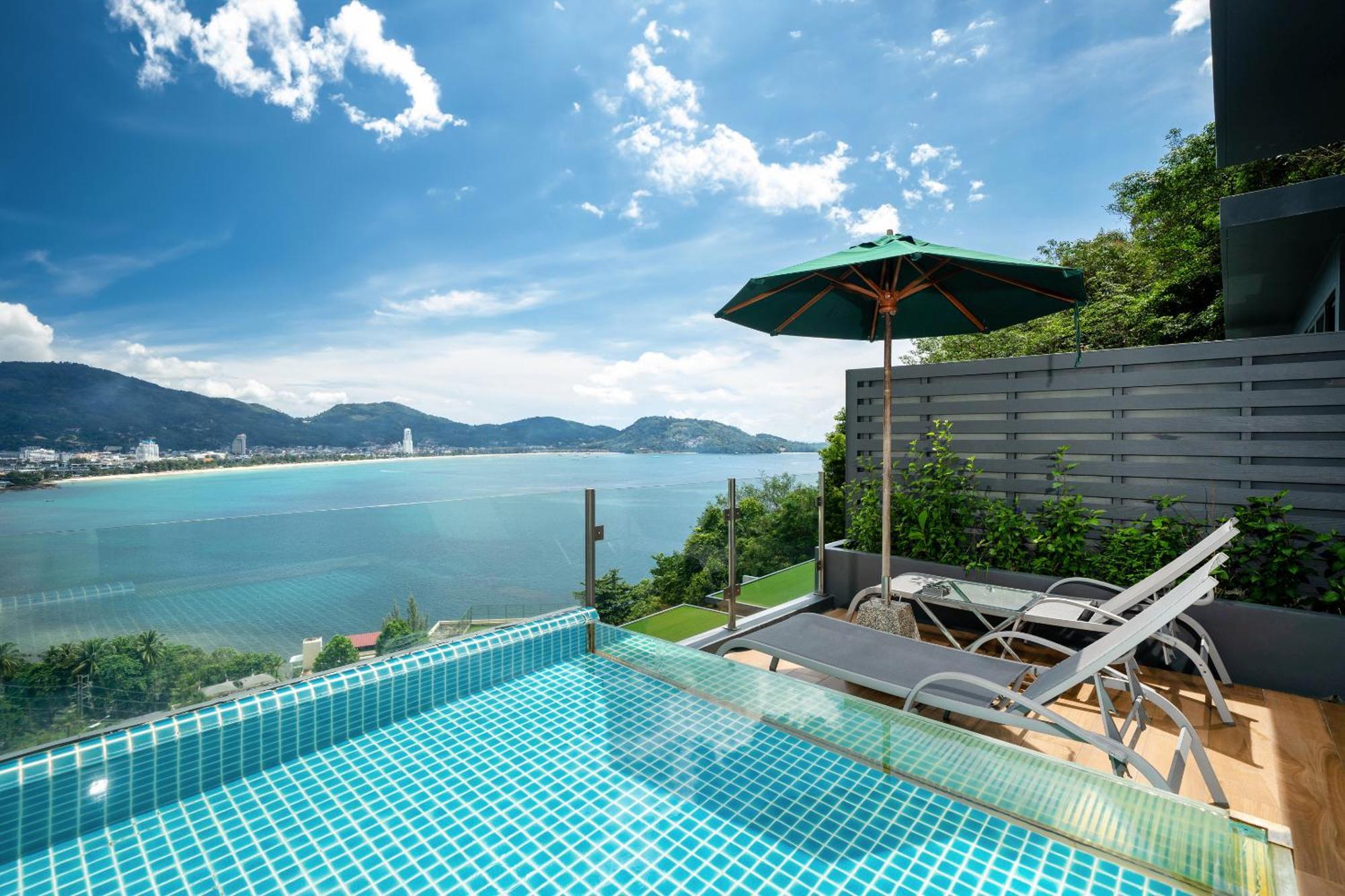 Indochine Resort And Villas - Sha Extra Plus Patong Exteriér fotografie View of the Andaman Sea from the pool of a villa at the resort